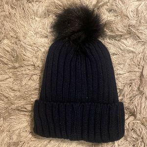 Black beanie with puff